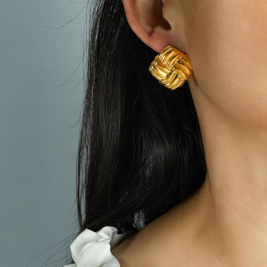 Clous d'oreilles Knott Luxe
